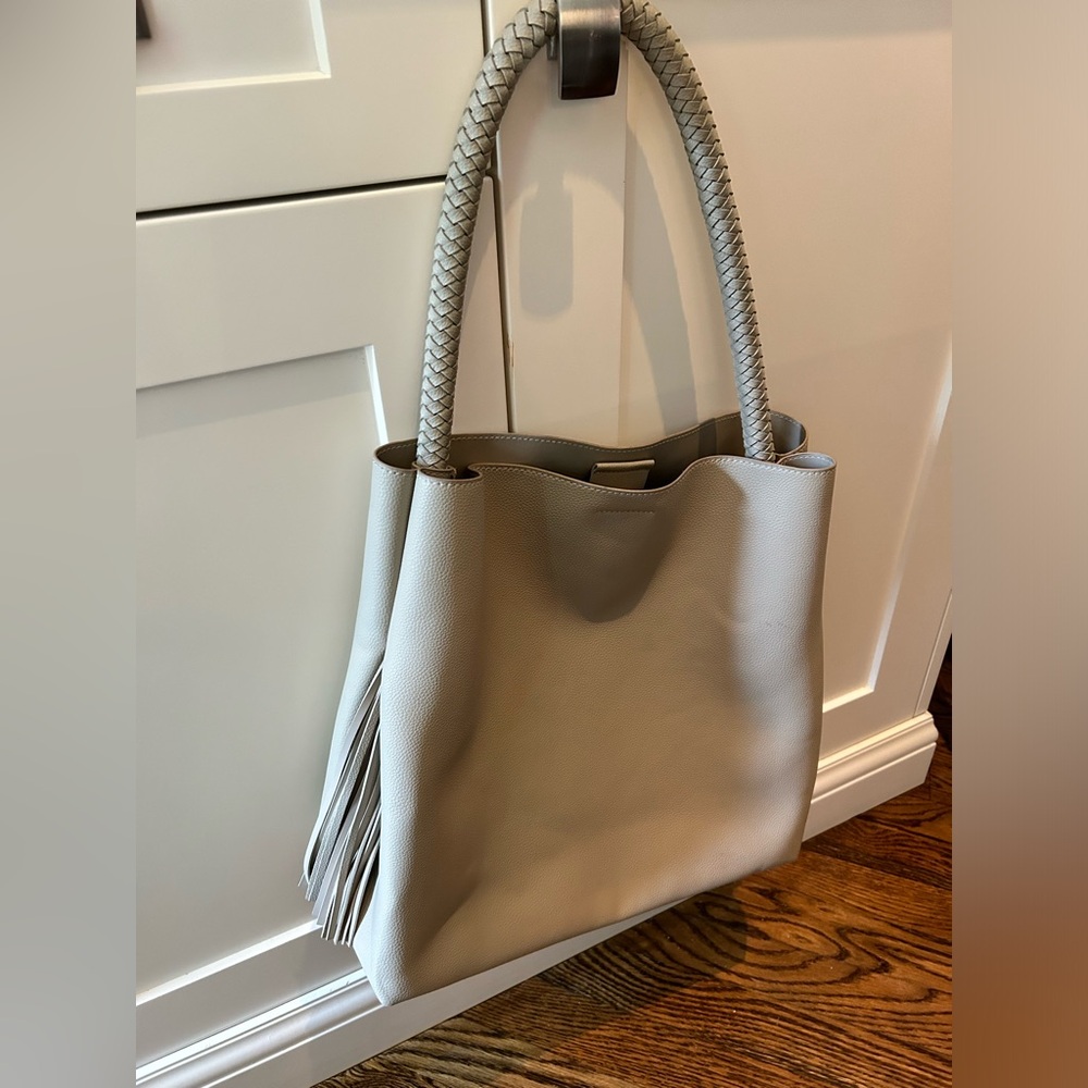 Grey/taupe coloured tote bag with tassels